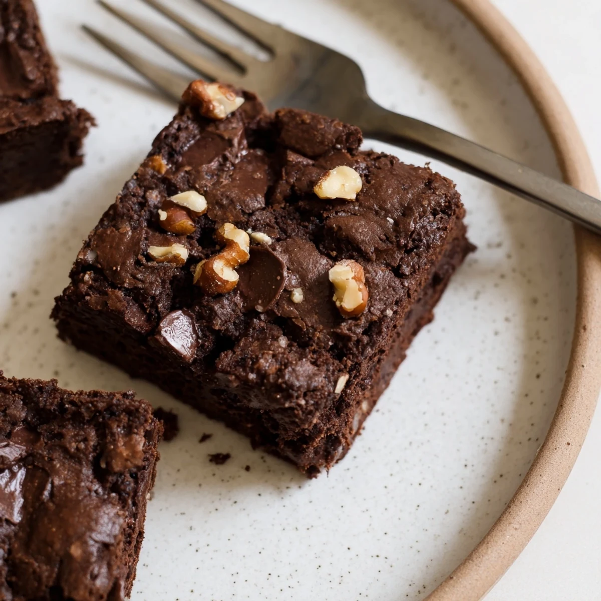 Decadent Zero-Waste Brownies using nut-milk pulp, topped with rich chocolate chips.  