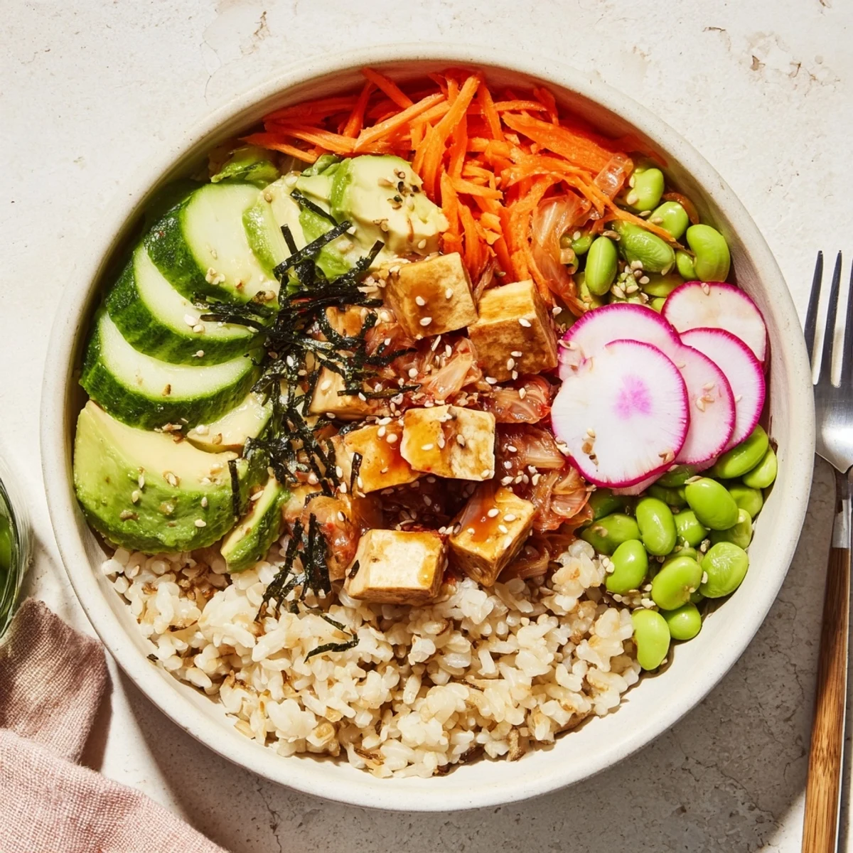 Vibrant fermented vegetable bowl topped with creamy avocado and crunchy radishes.  