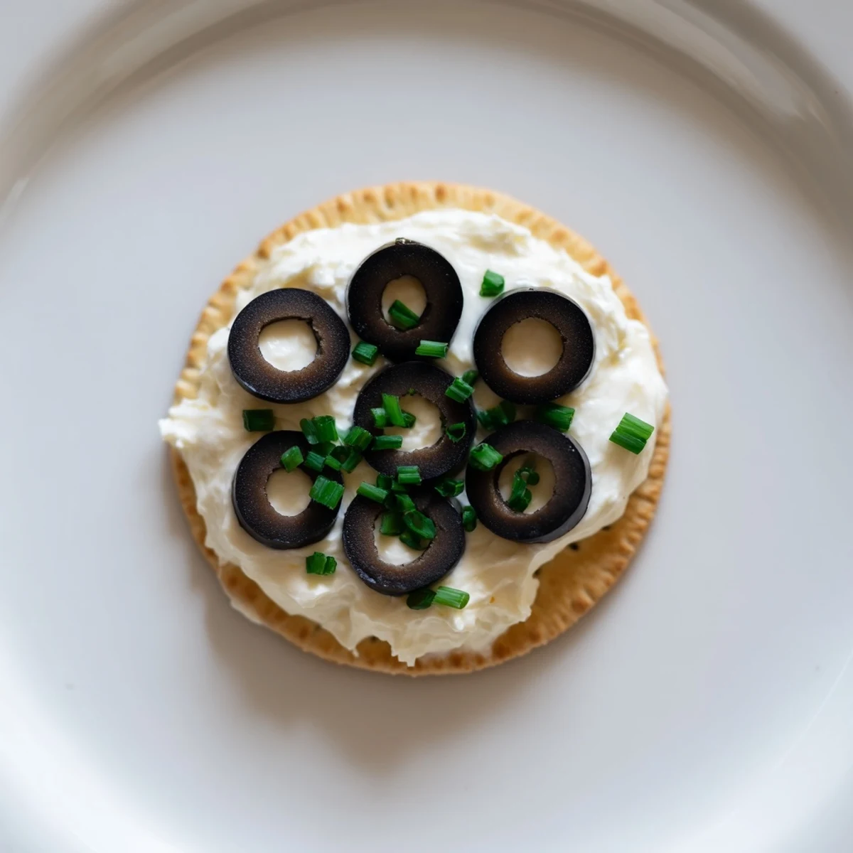A platter of eye-catching Gold Medal Olympic Ring Appetizers perfect for a healthy vegetarian snack.