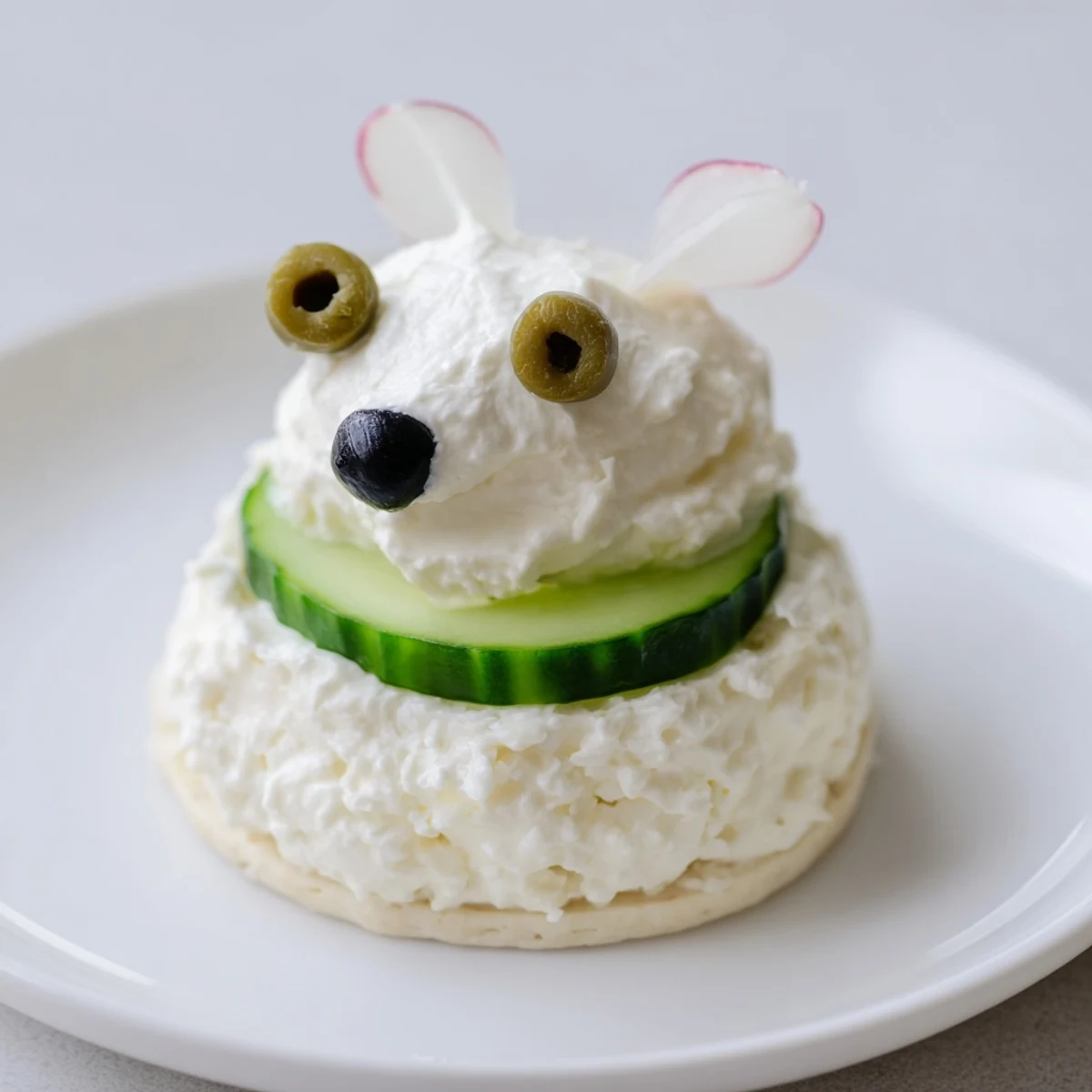 Savory Polar Bear Iceberg Cracker Stacks, a whimsical appetizer with caper eyes and olive noses shown ready to eat.