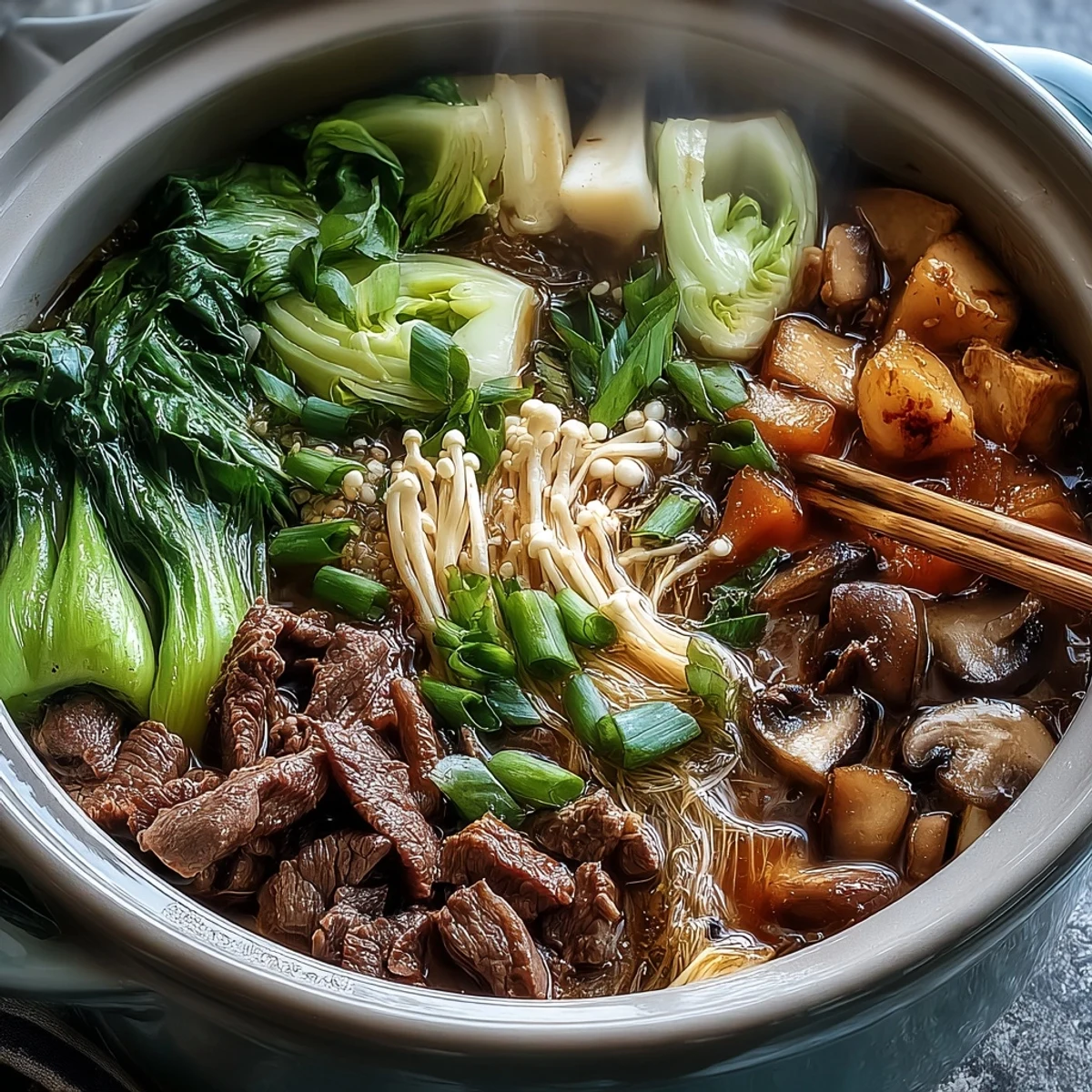 A variety of fresh ingredients including sliced meats, seafood, and vegetables arranged beautifully for an Asian hot pot meal.