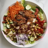 Homemade Chicken Salad features tender chicken mixed with vibrant veggies, ready to enjoy.