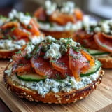 A vibrant Mother's Day Brunch Smoked Salmon Bagel Board, beautifully arranged with all the fixings.