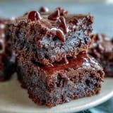 Gluten-free Fiber-Maxxing Bean Brownie Bites showcase rich, dark chocolate frosting.