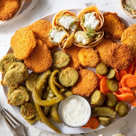 Crispy fried pickles served with tangy dill ranch sauce for the Pickle Lovers Meal.