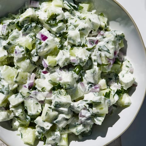 Vibrant Cucumber and Greek Yogurt Tzatziki Salad, with cool cucumbers and creamy yogurt, ready to enjoy.