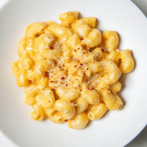 Golden, bubbling Pumpkin Mac & Cheese with a crispy panko topping, ready to serve and enjoy.