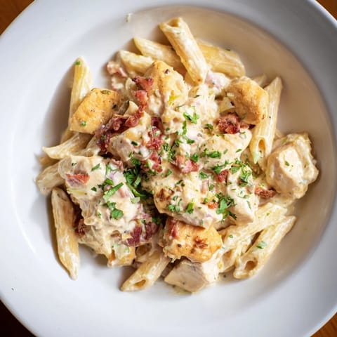 A beautiful bowl of Ranch Chicken & Bacon Penne, ready to be enjoyed as a comforting dinner.