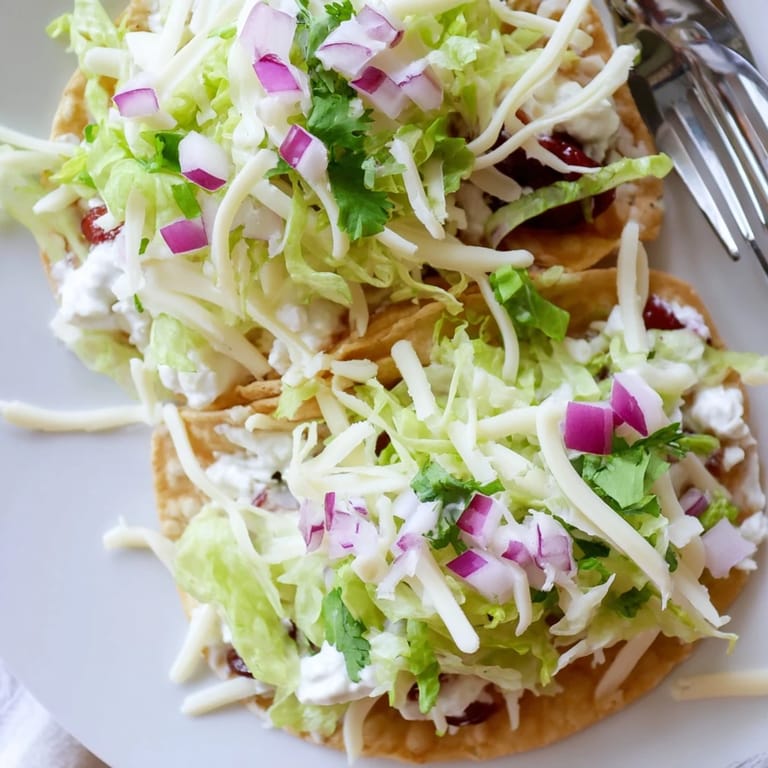 Delicious tacos loaded with zesty cranberry dip and vibrant fresh ingredients.