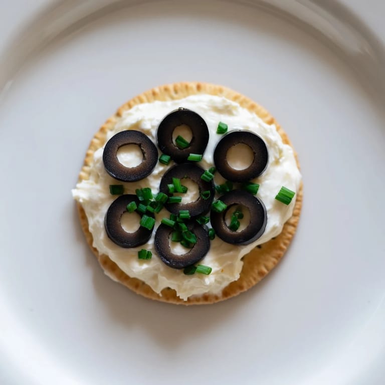 A platter of eye-catching Gold Medal Olympic Ring Appetizers perfect for a healthy vegetarian snack.