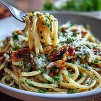Bright lemon butter pasta with tender peas and Parmesan, perfect for a light spring dinner.  